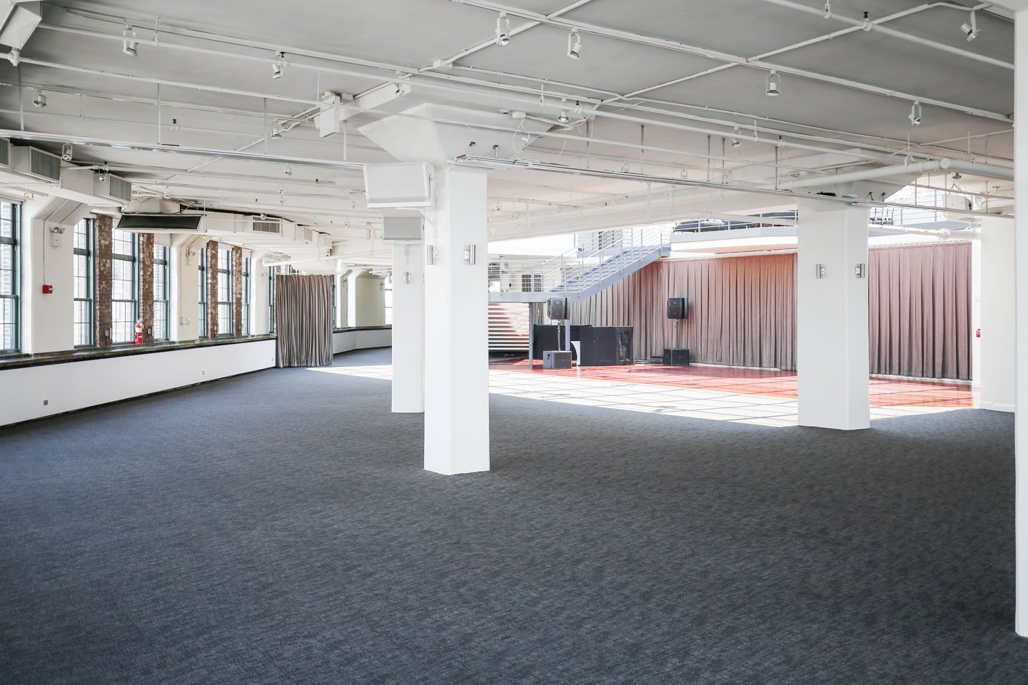photo: indoor event space with elegant white columns